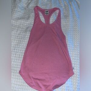 PINK RIBBED DOLPHIN HEM TANK TOP